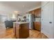View of the kitchen featuring an island with granite countertops at 1060 Crescent Ridge Dr, Buford, GA 30518