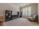 Comfortable living room with ample space, natural light, and stylish built-in shelves at 1060 Crescent Ridge Dr, Buford, GA 30518