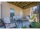 Cozy patio with comfortable seating, perfect for relaxing and enjoying the outdoor space at 1060 Crescent Ridge Dr, Buford, GA 30518
