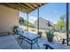 A delightful patio area with seating and views of the landscaped backyard at 1060 Crescent Ridge Dr, Buford, GA 30518