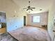 A spacious bedroom with outdated carpet, textured ceilings and walls needing repair at 35 Belmont Way, Covington, GA 30016