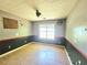 Empty bedroom featuring an accent wall, and hardwood floors at 35 Belmont Way, Covington, GA 30016
