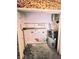 A utility closet features the water heater with some shelving at 35 Belmont Way, Covington, GA 30016