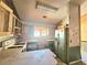 Kitchen featuring dated appliances, and unfinished cabinets at 35 Belmont Way, Covington, GA 30016