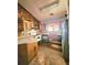 Kitchen featuring dated appliances, and unfinished cabinets at 35 Belmont Way, Covington, GA 30016