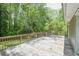 This is the home's expansive back deck with natural lighting at 2374 Rolling Acres Sw Dr, Conyers, GA 30094
