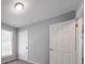 This bedroom features carpet flooring, a window, and a closet at 2374 Rolling Acres Sw Dr, Conyers, GA 30094