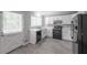 Updated kitchen with stainless steel sink, dishwasher, and plenty of natural light at 2374 Rolling Acres Sw Dr, Conyers, GA 30094