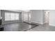 Open living room area features updated floors, lots of natural light and neutral paint at 2374 Rolling Acres Sw Dr, Conyers, GA 30094