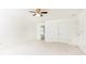 Spacious bedroom features a double door closet, carpet, and a ceiling fan at 3759 Wescott Ne Cv, Brookhaven, GA 30319