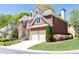 Charming two-story brick home with a well-manicured lawn and beautiful landscaping at 3759 Wescott Ne Cv, Brookhaven, GA 30319