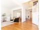 Bright living room with hardwood floors and open floor plan to dining area at 3759 Wescott Ne Cv, Brookhaven, GA 30319