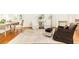 Comfortable living room featuring a neutral rug, and a blend of textures at 3759 Wescott Ne Cv, Brookhaven, GA 30319