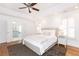 This bright main bedroom has recessed lighting, a ceiling fan and hardwood floors at 3759 Wescott Ne Cv, Brookhaven, GA 30319