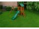 Backyard featuring a wooden playset with a slide and swing at 3759 Wescott Ne Cv, Brookhaven, GA 30319