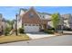 Lovely two-story brick home with a two-car garage and beautiful landscaping in a desirable neighborhood at 518 Coral St, Marietta, GA 30064