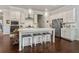 Modern kitchen with white cabinets, quartz countertops, and stainless steel appliances, perfect for cooking and entertaining at 518 Coral St, Marietta, GA 30064