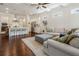 Open concept living area with a kitchen, fireplace and hardwood floors at 518 Coral St, Marietta, GA 30064