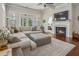 Cozy living room with a fireplace, large sectional, and plenty of natural light at 518 Coral St, Marietta, GA 30064