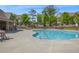 Community pool area featuring ample seating and well-maintained landscaping at 518 Coral St, Marietta, GA 30064