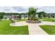Community park with benches, sidewalks, gazebo, green space, and landscaping for residents to enjoy at 5638 Berney Cir, Powder Springs, GA 30127