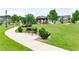Well-maintained community park featuring a gazebo, benches, sidewalks, lush green space, and inviting landscaping at 5638 Berney Cir, Powder Springs, GA 30127