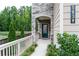 Inviting front entrance with stone accents and manicured greenery, creating a welcoming first impression at 5638 Berney Cir, Powder Springs, GA 30127