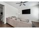 Comfortable living room with a large sofa and TV, designed for relaxation and entertainment at 5638 Berney Cir, Powder Springs, GA 30127