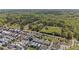 Beautiful aerial view of a community featuring well-maintained homes and lush green spaces and wooded areas at 127 Ravenhurst Dr, Fayetteville, GA 30214