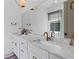 Bright bathroom with double vanity, marble countertop, and modern fixtures at 127 Ravenhurst Dr, Fayetteville, GA 30214