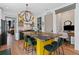 Modern kitchen with a large island, stylish seating, and updated appliances at 127 Ravenhurst Dr, Fayetteville, GA 30214