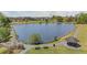 Scenic pond with a gazebo, walking paths, and lush landscaping in a community park setting at 127 Ravenhurst Dr, Fayetteville, GA 30214