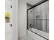Modern bathroom featuring a tiled shower with a glass enclosure at 2059 Mozelle Dr, Marietta, GA 30062