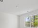 Bright bedroom featuring a window and white paint at 2059 Mozelle Dr, Marietta, GA 30062