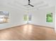 Bright bedroom with hardwood floors, ceiling fan and large windows at 2059 Mozelle Dr, Marietta, GA 30062