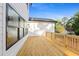 View of the deck with wooden boards and white siding at 2059 Mozelle Dr, Marietta, GA 30062