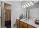Bathroom featuring a vanity with sink, mirror, and a shower/tub combination with neutral finishes at 215 The Farm Rd, Mcdonough, GA 30252