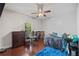 Bedroom featuring a desk and work space, a large window, and comfortable modern furniture at 215 The Farm Rd, Mcdonough, GA 30252