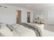 Bright bedroom featuring neutral paint, carpet, and stylish accent furniture at 3409 Catalan Aly, Decatur, GA 30032