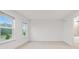 Bright bedroom with beautiful views and doorway leading to the en-suite bathroom at 3409 Catalan Aly, Decatur, GA 30032