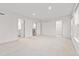 Large bedroom with neutral carpet and three doorways leading to en-suite bath and walk-in closet at 3409 Catalan Aly, Decatur, GA 30032