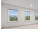 Bright bedroom featuring beautiful views from the three large windows at 3409 Catalan Aly, Decatur, GA 30032
