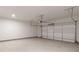 Spacious two car garage with concrete floor and white walls at 3409 Catalan Aly, Decatur, GA 30032