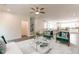 Spacious living room with stairs, stylish furnishings, and an open layout that connects to the kitchen and dining area at 3409 Catalan Aly, Decatur, GA 30032