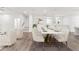 Bright living and dining area with contemporary furnishings, hardwood floors, and a staircase at 3409 Catalan Aly, Decatur, GA 30032