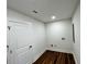 Laundry room featuring vinyl floors, washer and dryer hookups, and door to exterior at 6751 Davidson Ct, Lithonia, GA 30058