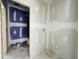 Bathroom showing the rough-in stage, with drywall, plumbing, and blue waterproof drywall at 3375 Hillshire Dr, Cumming, GA 30028