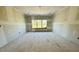 Bedroom is shown during the drywall construction phase, before painting and finishes at 3375 Hillshire Dr, Cumming, GA 30028