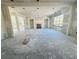 Spacious unfinished living room with potential, featuring natural light from large windows and versatile open layout at 3375 Hillshire Dr, Cumming, GA 30028