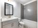 Bathroom featuring a tub/shower combination with gray subway tile and a modern vanity at 4201 Hosch Reserve Dr, Buford, GA 30519